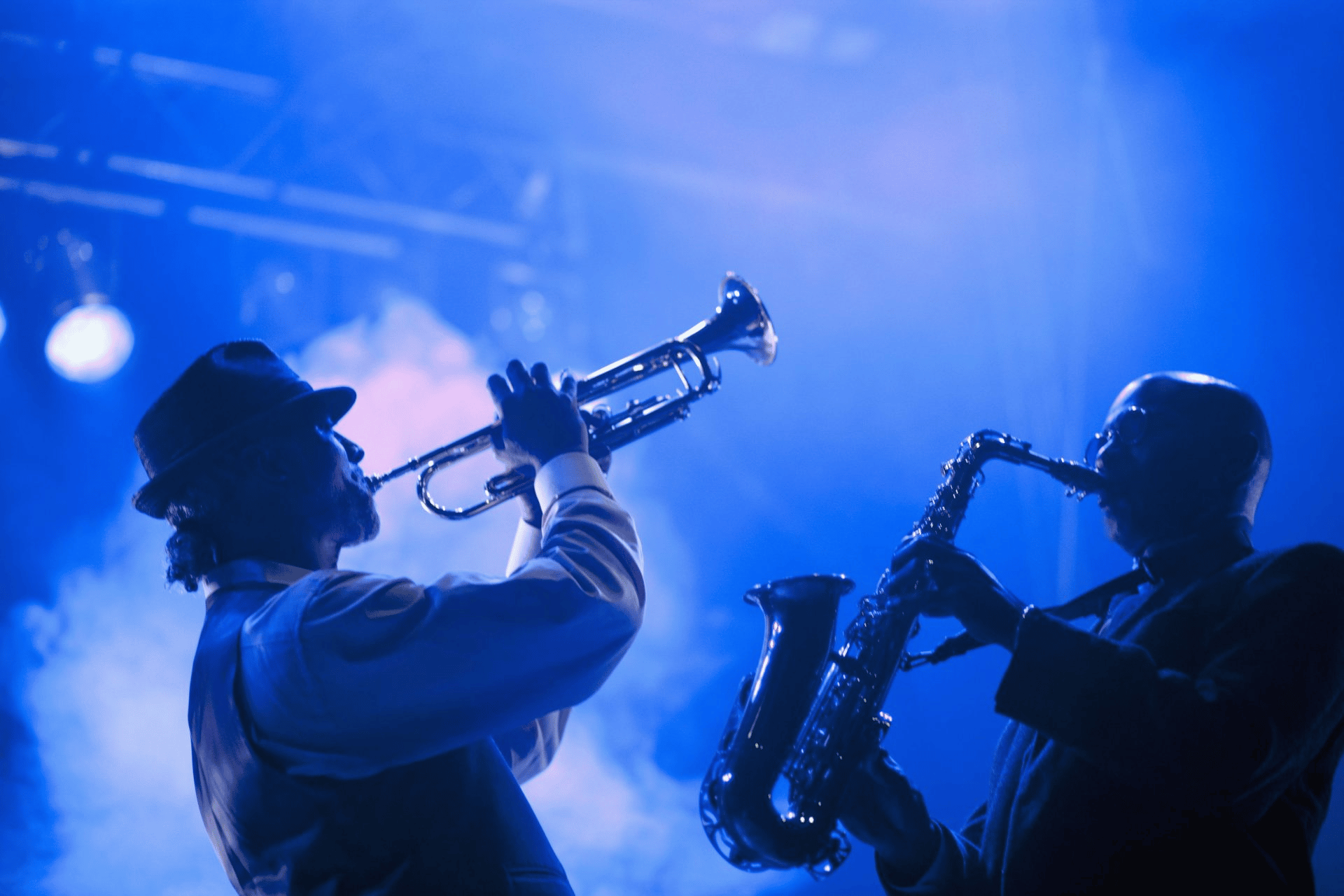 jazz players playing trumpet and saxophone