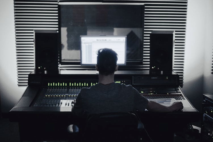 a sound designer in his studio